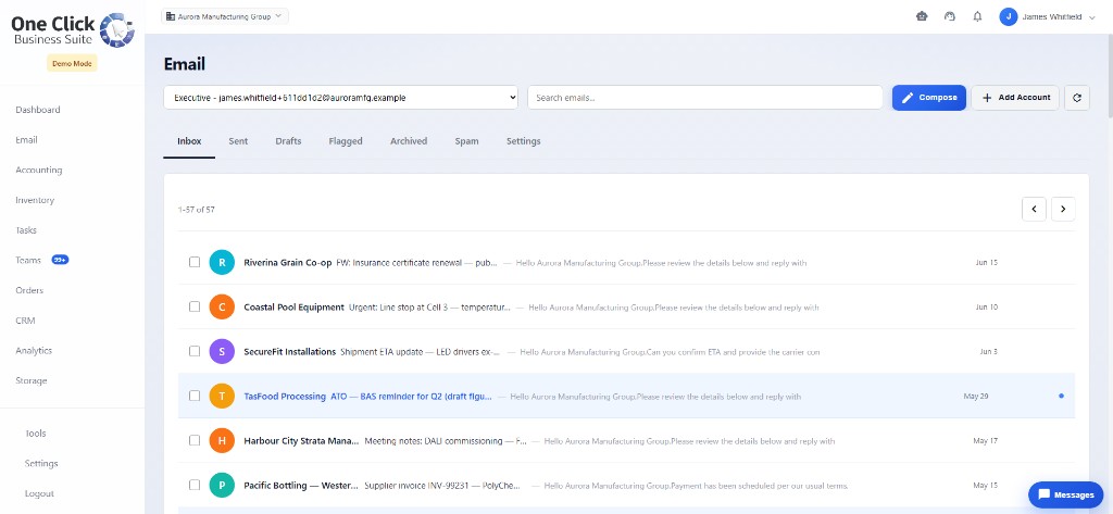 Business email inbox displayed on a laptop in a modern workspace